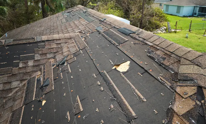Roof leaking inside a home during heavy rain in Ireland with water damage on ceiling